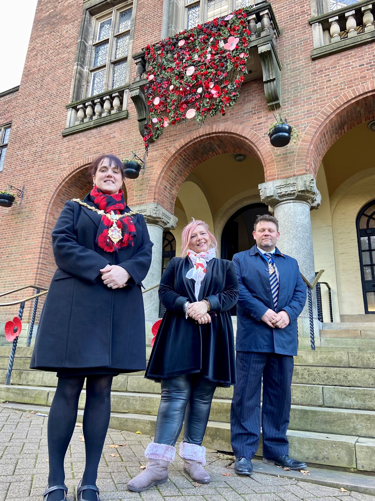 Councillor Andrea Goddard, Mayor of Dudley, with Rose Cook-Monk poppy organiser and Councillor James Clinton, Mayor's consort.