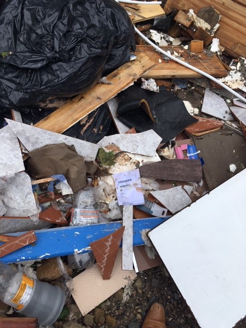 Burnley fly tipping with invoice showing