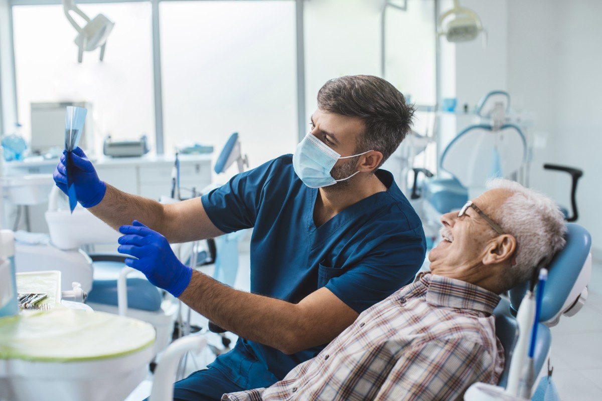 GettyImages-1369227721 (dentist and patient)
