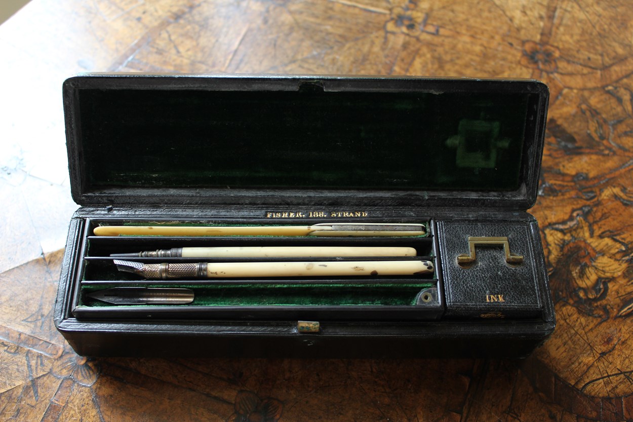 Marianne Nicholson's pen set: This pen set belonged to Marianne Nicholson. She would have used it to write all her letters to Florence Nightingale when she was young. It contains a pen with nibs, ink, a pen wipe, a seal engraved with MN and a stick for rubbing paper ready for a wax seal.