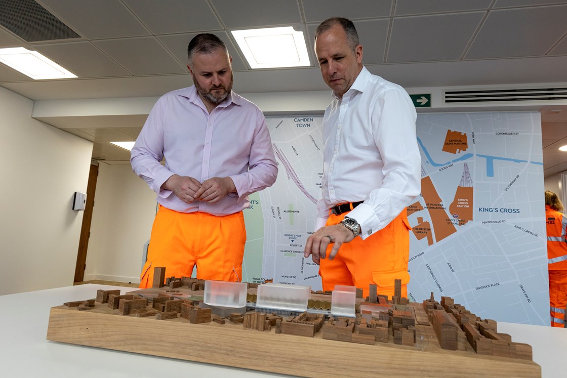 HS2 Minister Andrew Stephenson viewing model of HS2's Euston station-7: HS2 Minister, Andrew Stephenson MP, views a 1:1000 scale model of HS2’s Euston station. He is being shown the model by Laurence Whitbourn, HS2’s Euston Area Director. The model is being used at HS2’s engagement events throughout May and June 2022. 

The model is displayed with indicative oversite development that is enabled by the construction of the HS2 station. Oversite development will be delivered by HS2’s Master Development Partner, Lendlease, who is embarking on an 18 month public consultation with the local community.

Tags: Euston, Model, HS2 Station, Camden, Community Engagement.

People (L-R): Andrew Stephenson MP, HS2 Minister; Laurence Whitbourn, HS2 Euston Area Director