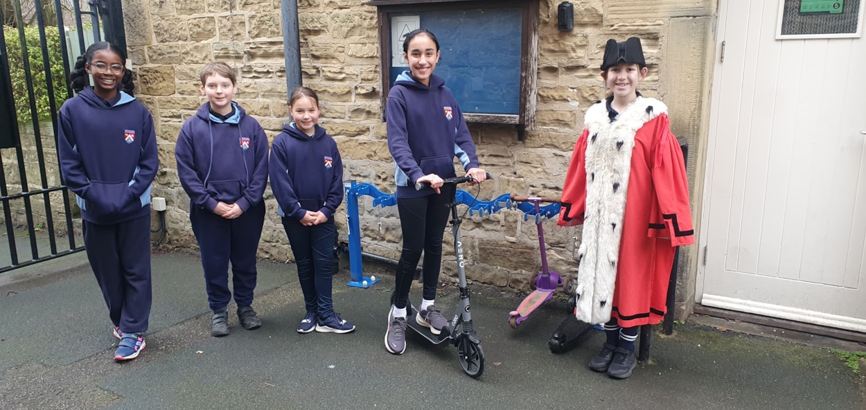 20260226 105204: Children's Mayor, Sienna from Harewood Church of England Primary School and pupils with scooter rack