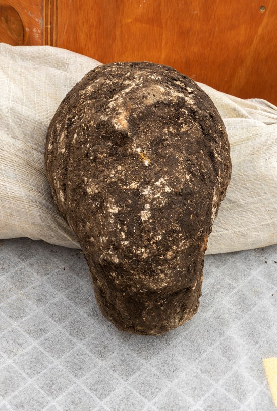 Stone child's head - Roman artefacts from St Mary's Archaeological dig - Stoke Mandeville, Buckinghamshire-15: Child’s head from Roman statue discovered during a HS2 archaeological dig at the site of old St Mary’s church in Stoke Mandeville, Buckinghamshire. The artefacts were found underneath the footprint of a Medieval church that was being excavated. 

Tags: Roman, Archaeology, Stoke Mandeville, Buckinghamshire