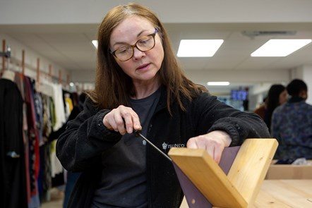 Theresa Corr, from Islington Council's joinery team, doing woodwork