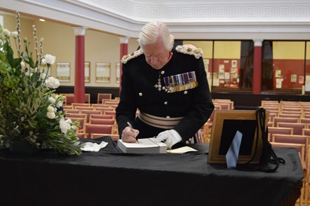 Lord Lieutenant of Moray, Major General Seymour Monro, signs the books of condolence for Her Majesty The Queen in St Giles Church, Elgin, which hosted the Service of Thanksgiving on 23 September 2022.
