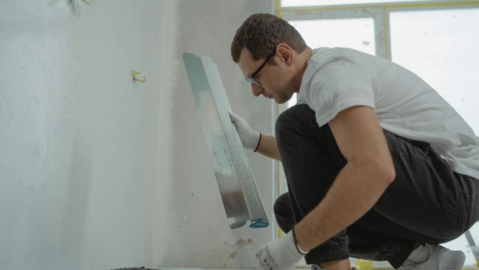 Trader working in house