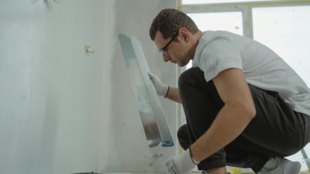 Trader working in house