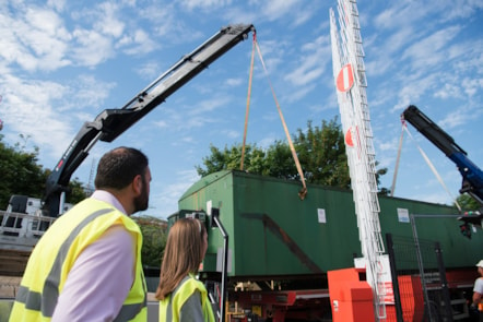 Kayleigh Ingham and Andrew Cullen look on as the fuel tank is removed 2