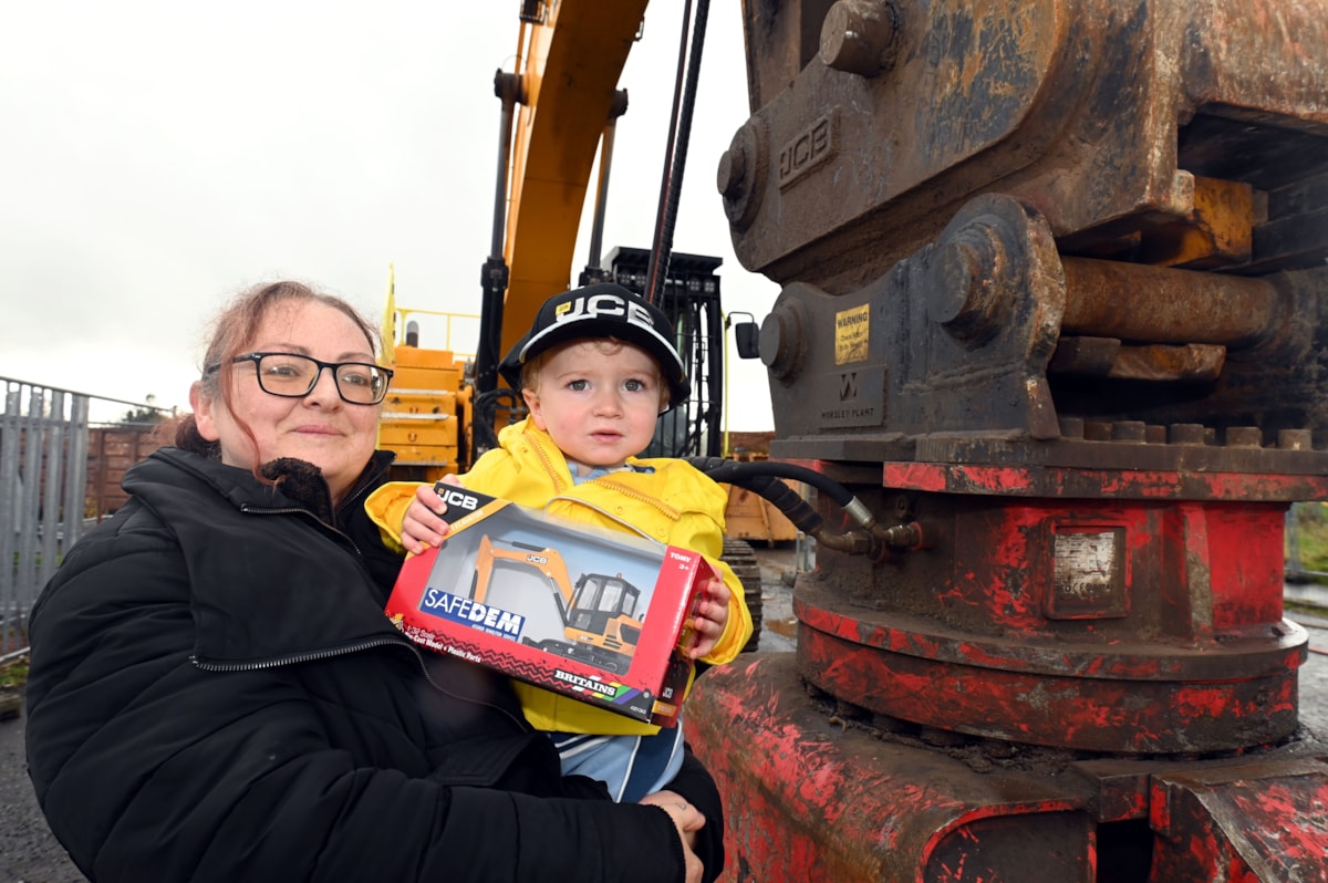 Myles and mum Michelle visit the demolition site