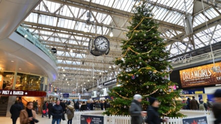 Waterloo railway station concourse - with Christmas tree and clock