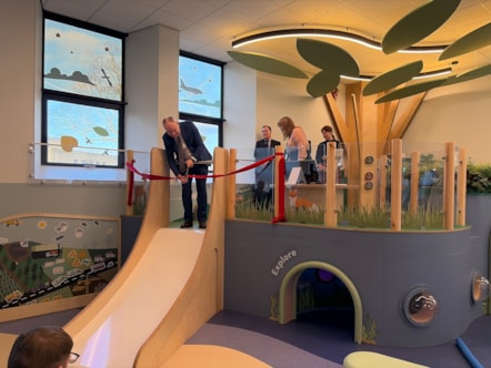 Minister ribbon cutting