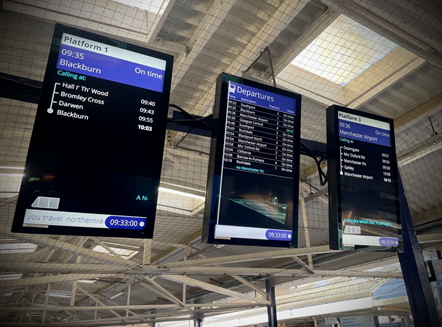 This image shows the new full colour screens being installed across Northern stations