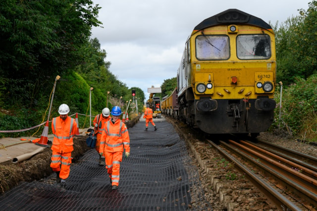Engineering train beside dug out track bed Parbold July 2026: Engineering train beside dug out track bed Parbold July 2026