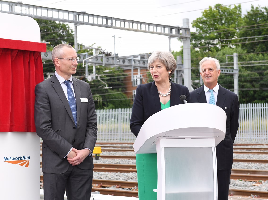 Theresa May with Mark Langman (L), Network Rail Western Route MD, and Tim O'Toole (R), CEO of FirstGroup