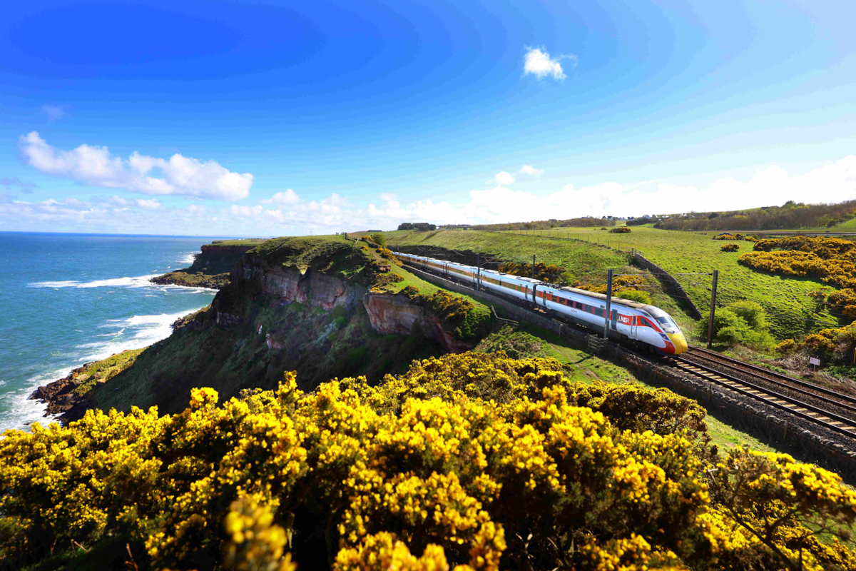 Summertime, an LNER Azuma along the Northumberland coastline, credit LNER (1)