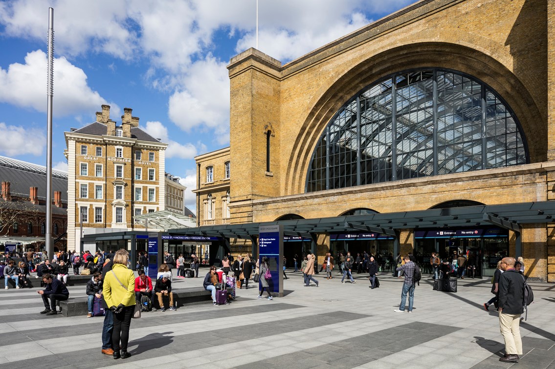 King's Cross railway station - King's Square: King's cross railway station
clock tower
king's square
train station
busy
people
crowds
day