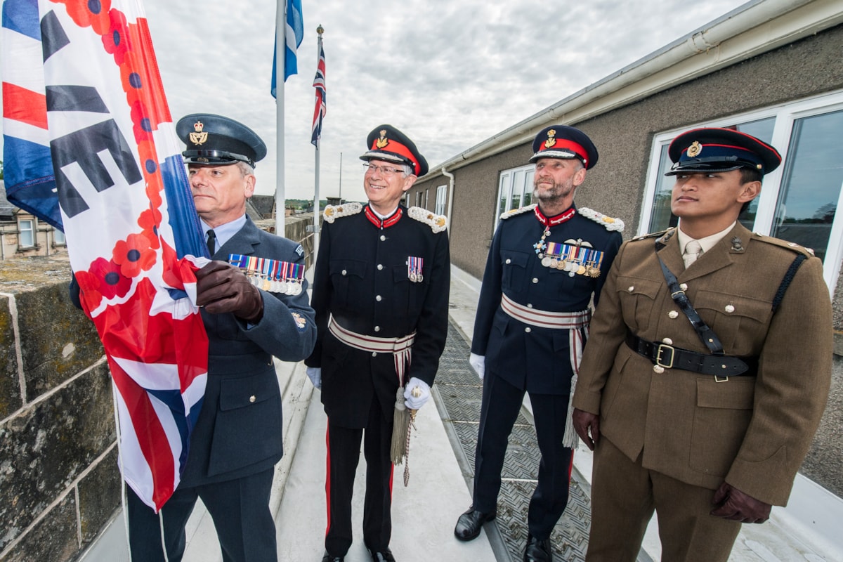 Station Warrant Officer at RAF Lossiemouth Joe Mulholland, Lord Lieutenant of Banffshire Andrew Simpson, Lord Lieutenant of Moray Al Monkman and Lieutenant Subin Gurung from 39 Engineer Regiment at Kinloss raise the VE Day 80 flag.
Image: Image: Jason Hedges/DC Thomson