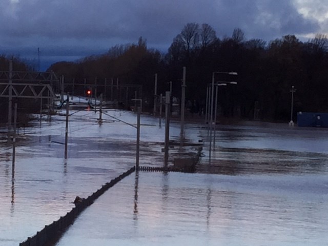 Eight foot-deep floodwater means northern section of West Coast main line to remain closed for several days: Flooding on the West Coast main line north of Carlisle