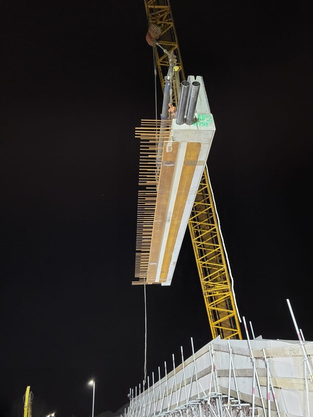 Parapet wall being lifted in: Parapet wall being lifted in