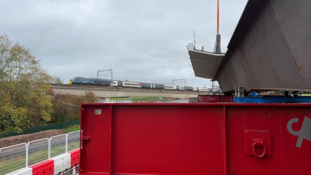 Avanti West Coast Pendolino going over Clifton Bridge with view of new structure in the foreground: Avanti West Coast Pendolino going over Clifton Bridge with view of new structure in the foreground
