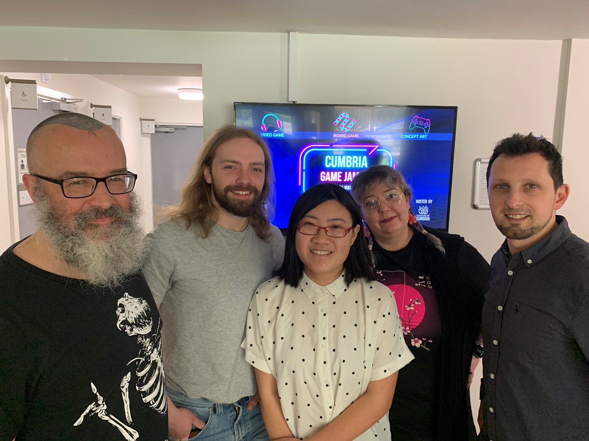 (l-r) University of Cumbria GameJam 2023: keynote speaker and judging panel member Dr Ian Sturrock, winners Charlie Anderson and Suki Shek, and university Game Design lecturers Nimue Von-Lind and Lucian Toma