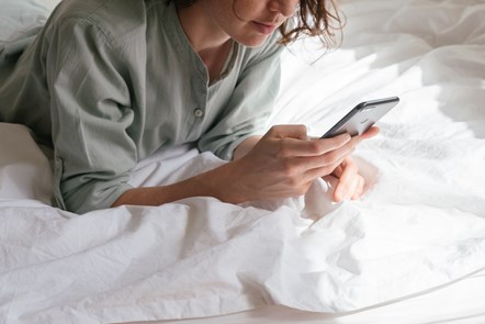 woman-using-smartphone-in-bed-3060643-2