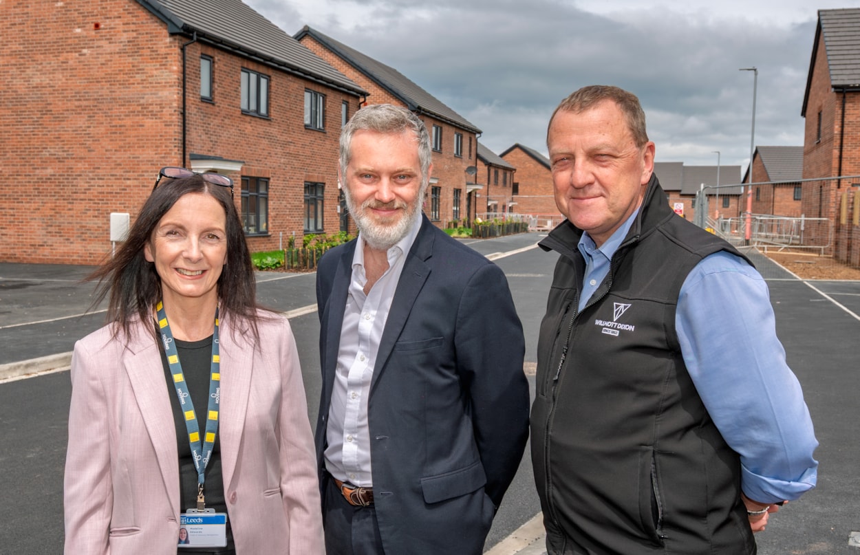 Swinnow housing 4: Madeleine Kenning (head of housing management, Leeds City Council), Councillor Peter Carlill (Leeds City Council’s executive member for transport and planning) and Kevin Busby (site manager, Willmott Dixon) at the new Hough Top housing development in Swinnow, near Pudsey.