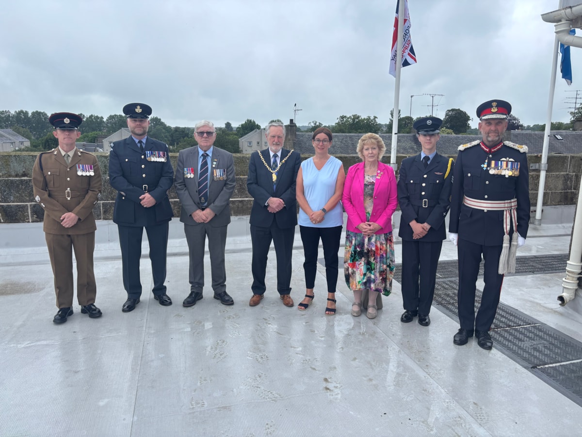 From left to right: WO2 Johnpaul Johnstone of 39 Engineer Regiment; WO James Stoddart of RAF Lossiemouth; Armed Forces Champion Cllr Peter Bloomfield; Civic Leader Cllr John Cowe; Council Leader Cllr Kathleen Robertson; Deputy Lieutenant for Banffshire, Rev Dr Kay Gauld; Lord Lieutenant's Cadet, Cad