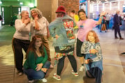 Female Funk Fruition 2: A group of six dancers try out different poses while smiling at the camera