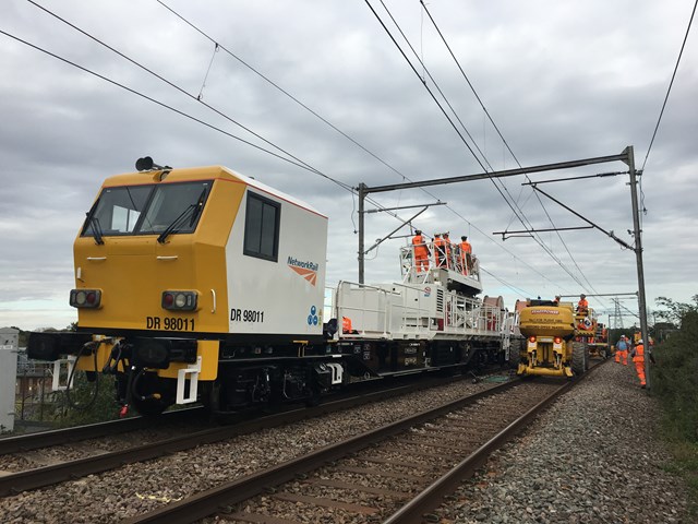 Wiring train installing the new overhead wires