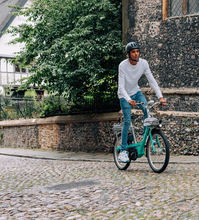 Beryl-Norwich-JakeBaggaley-0795-2: A cyclist commuting in Norwich