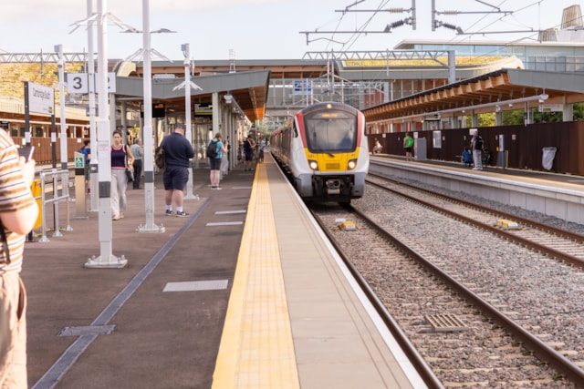Greater Anglia train service arriving at a platform in Cambridge South station: Greater Anglia train service arriving at a platform in Cambridge South station