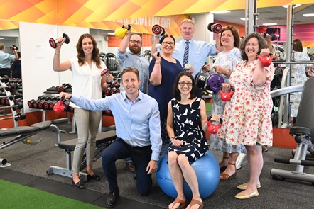 Photo shows representatives from Reading Council and GLL celebrating the improvements to Meadway Leisure Centre.