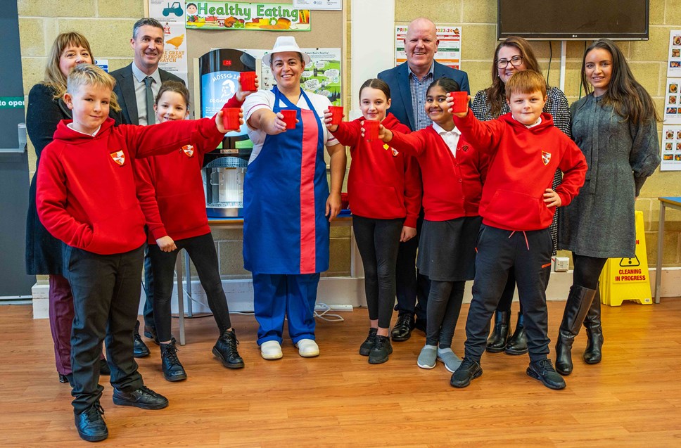 Cllrs Barton and Cowan with Chris Walker, Pamela Docherty and Michelle from Catering Services and Miss McNulty with the Eco Committee