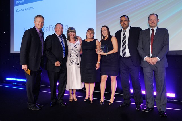 The Halton Scaffolding team pick up their special award for Workington North station