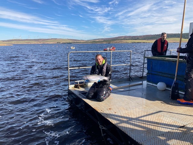 Llyn Brenig Fish Farmer Jack Finney stocking lake March 2022