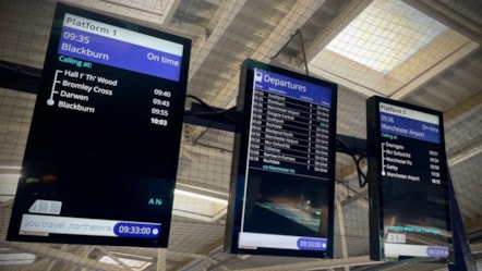 This image shows the new full colour screens being installed across Northern stations