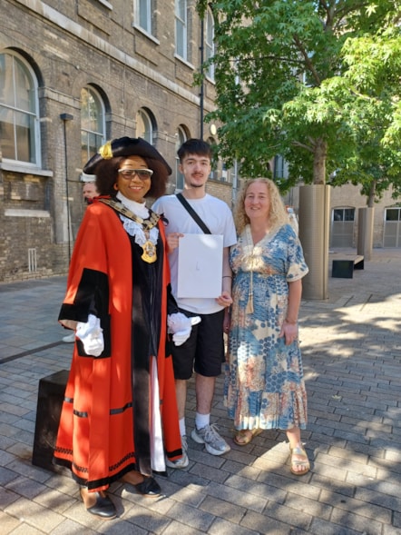 Central Foundation Boys' School student Jake celebrates his A Level results with the Mayor of Islington Cllr Rosaline Ogunro, left, and Islington Council Leader Cllr Una O'Halloran, right