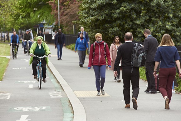 £101 million investment to boost cycling and walking nationwide: A segregated cycle lane and footpath in Manchester