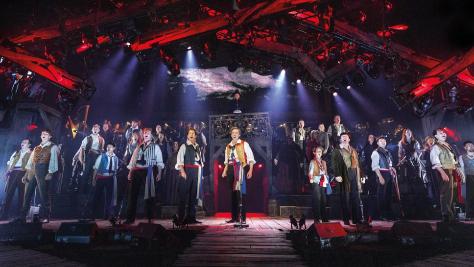 LES MISERABLES THE ARENA SPECTACULAR. Enjolras (James D. Gish) and Ensemble - photograph by Danny Kaan