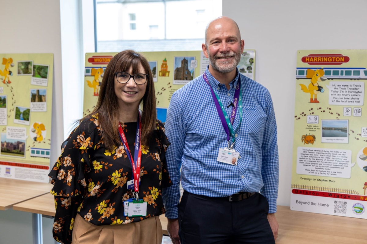 Image shows Northern's Max Myers and Warren Birch from the local Community Rail Partnership