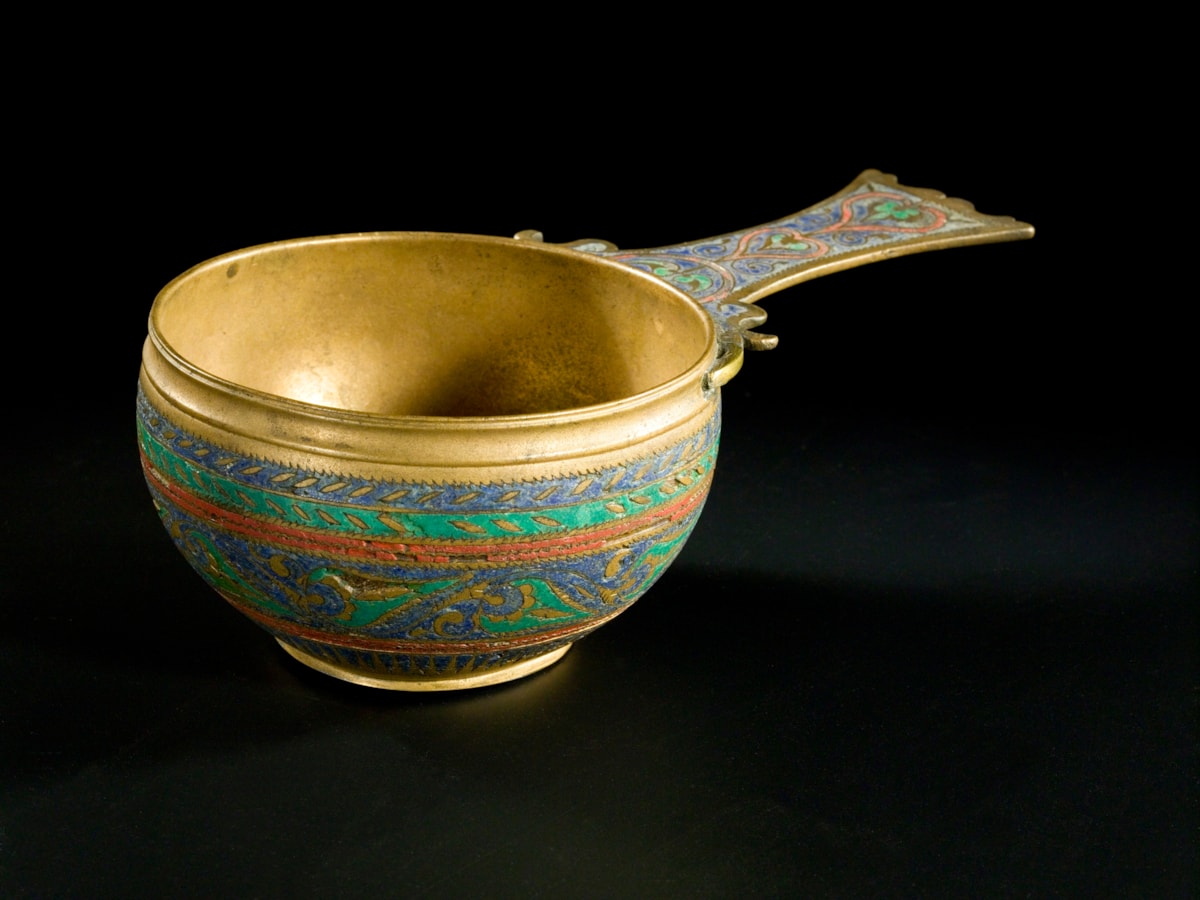Leaded bronze skillet with enamel , Linlithgow, 1st or 2nd century AD.Image © National Museums Scotland (2)
