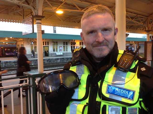 BTP Chief Inspector for Wales Mark Cleland with the 'beer goggles' passengers are being invited to try out