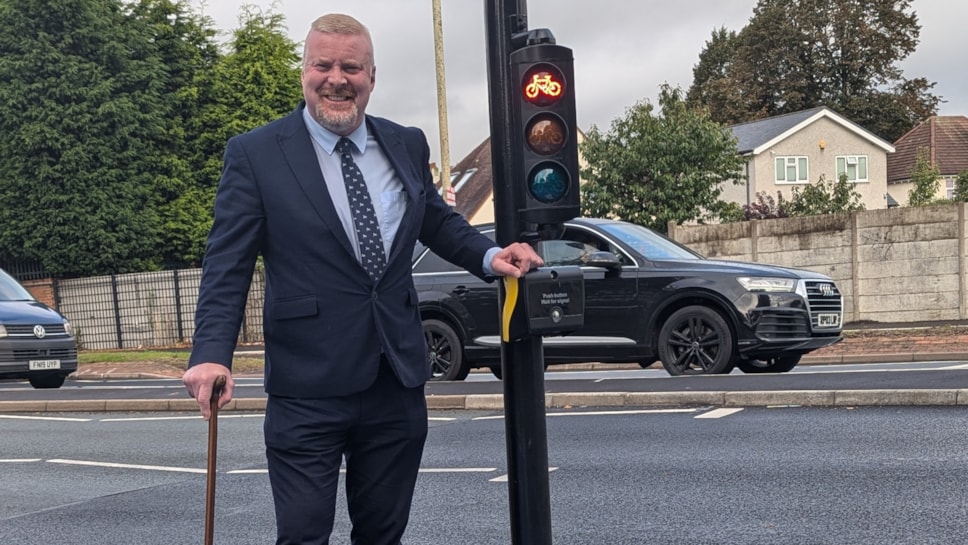 Cllr Damian Corfield at one of the new crossings on Birmingham New Road