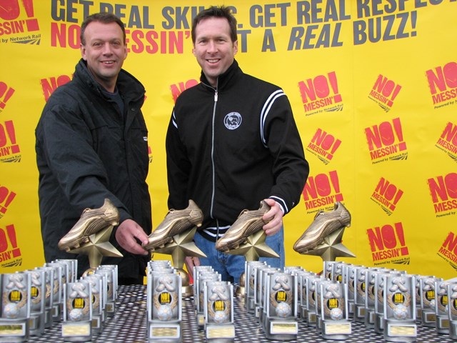 YOUNGSTERS OF DERBYSHIRE TACKLE RAILWAY CRIME AT MOOR FARM: DCFC president and chief executive, Tom Glick and Network Rail area general manager, Mark Tarry present trophies