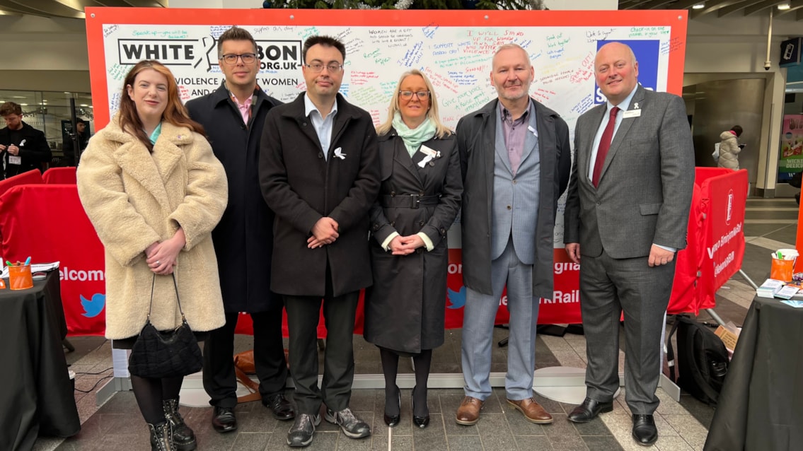 Network Rail and partners unite to support White Ribbon campaign in Birmingham: (From left to right) Councillor Nicky Brennan; Jonny Wiseman, customer experience director at West Midlands Railway; Laurence Turner MP; Denise Wetton, director for Network Rail Central route; Mal Drury-Rose, director of rail for Transport for West Midlands; Andy Mellors, managing director for Avanti West Coast