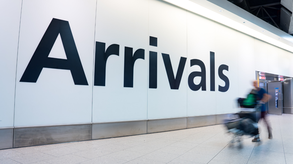 Covid-19, budget constraints and flight disruption concern biggest barriers to air travel, UK Civil Aviation Authority survey finds: Arrivals signage at airport