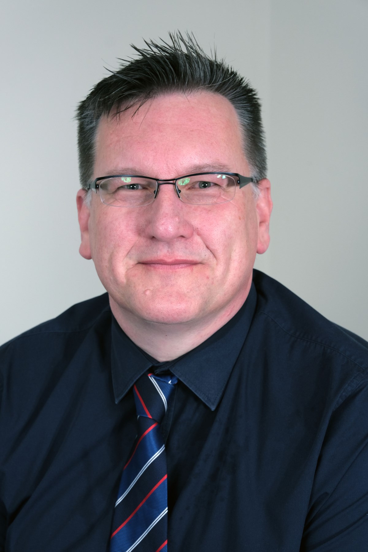 Cllr Guy Woodham, Cabinet Member for Education and Welsh Language
