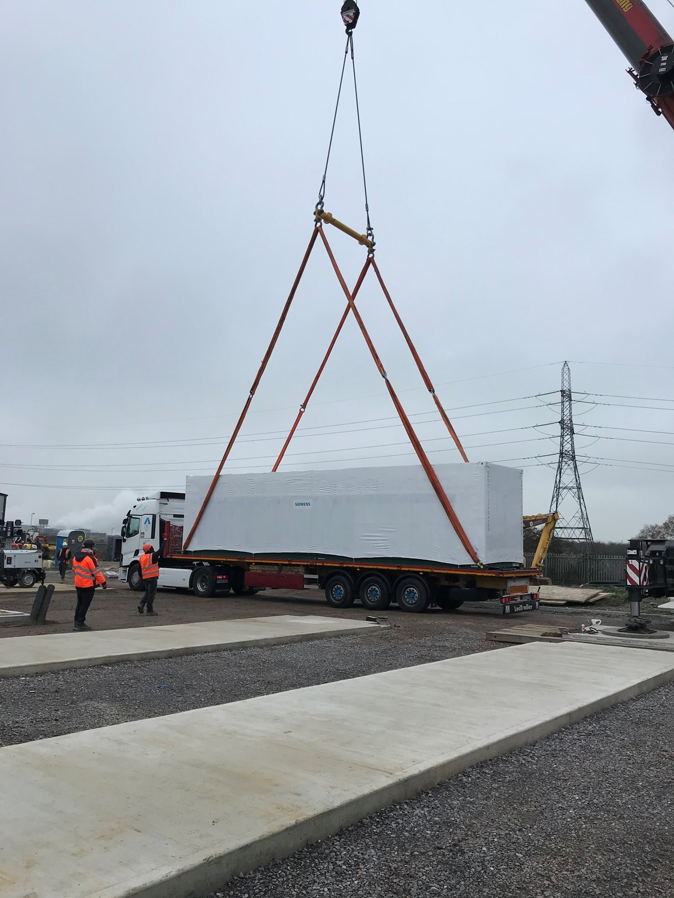 Conrad Energy  - generator sets being lifted onto site